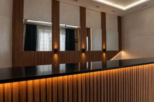 TV a/nebo společenská místnost v ubytování Hotel Astral + 11 fotografií
