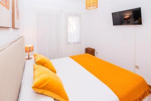 A bed or beds in a room at Villa Tropical Private Pool Capellania By Holidays Home