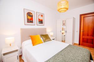 A bed or beds in a room at Villa Tropical Private Pool Capellania By Holidays Home