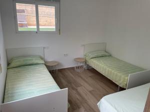 Postel nebo postele na pokoji v ubytování Ferienwohnung Benidorm
