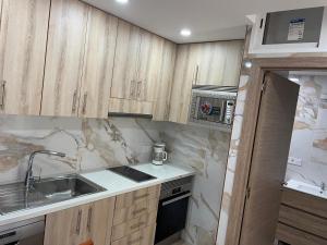Kuchyň nebo kuchyňský kout v ubytování Ferienwohnung Benidorm