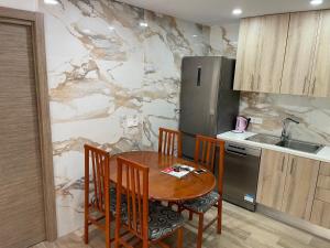 Kuchyň nebo kuchyňský kout v ubytování Ferienwohnung Benidorm