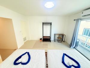 Phak Phing Hostel客房内的一张或多张床位