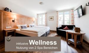 Voodi või voodid majutusasutuse Grüner Baum Naturparkhotel & Schwarzwald-Restaurant toas