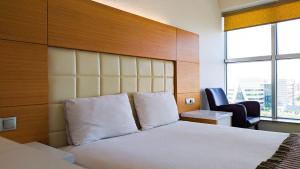 Postel nebo postele na pokoji v ubytování Nüzhet Hotel + 20 fotografií