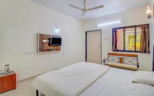 Fotografie z fotogalerie ubytování Girichintan Bunglow v destinaci Mahábalešvár + 37 fotografií