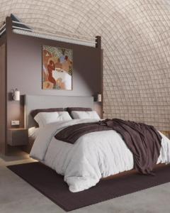 a bedroom with a large bed with white sheets at Mindori in Kvemo-Chocheti