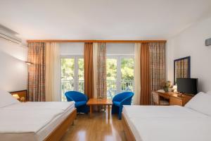 Postel nebo postele na pokoji v ubytování Orsan Maradiso Hotel by Aminess
