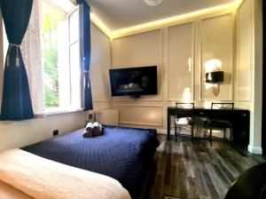 Posteľ alebo postele v izbe v ubytovaní Spa Bath Apartment