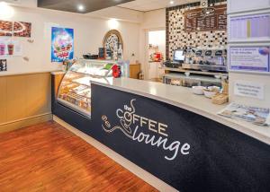 a coffee lounge with a counter in a store at Robin Hood Rhyl in Rhyl