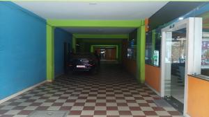 Fotografie z fotogalerie ubytování PPH Living TriColours Hotel Gandhipuram v destinaci Kójamputtúr