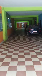 Fotografie z fotogalerie ubytování PPH Living TriColours Hotel Gandhipuram v destinaci Kójamputtúr