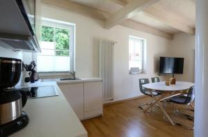 Dapur atau dapur kecil di Ferienhäuser unter Reet in Lohme Reethaus Svantevit +5 gambar