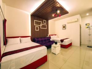 Postel nebo postele na pokoji v ubytování Easy Home Stay