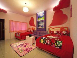 Postel nebo postele na pokoji v ubytování Easy Home Stay