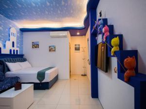 Postel nebo postele na pokoji v ubytování Easy Home Stay