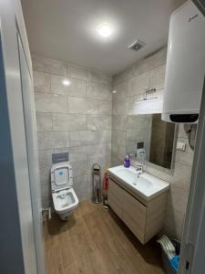 Ένα μπάνιο στο Guest House-MD