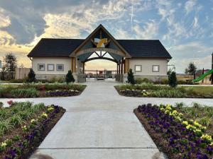 a building with a star on the top of it at 4-BR Cheerful Home Long Term Stay Equipped in Katy in Katy