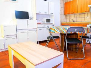Kuchyňa alebo kuchynka v ubytovaní Apartamento