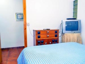 Posteľ alebo postele v izbe v ubytovaní Apartamento