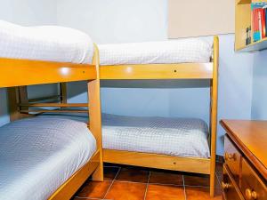 Poschodová posteľ alebo postele v izbe v ubytovaní Apartamento