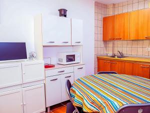 Kuchyňa alebo kuchynka v ubytovaní Apartamento