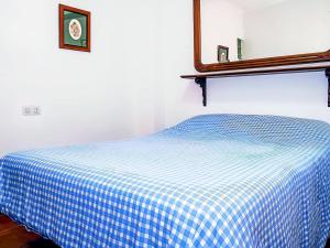 Posteľ alebo postele v izbe v ubytovaní Apartamento