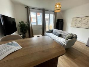 Khu vực ghế ngồi tại Vivez le Centre-ville et la Mer en Harmonie, appartement 1 chambre