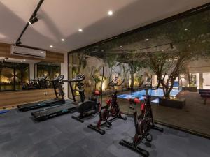 a gym with several exercise bikes in a room at 22 by spacey #54 Studio in Maadi in Cairo +5 photos