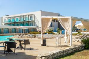 The swimming pool at or close to Baia dei Mulini Resort & Spa