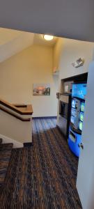 a hotel room with a popcorn machine in a room at King's Port Inn in Kennebunkport