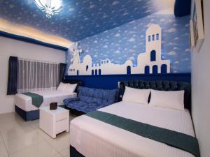 Postel nebo postele na pokoji v ubytování Easy Home Stay