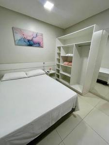 Ένα ή περισσότερα κρεβάτια σε δωμάτιο στο FLAT's TAVARES 101