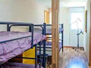 Posteľ alebo postele v izbe v ubytovaní Apartamento