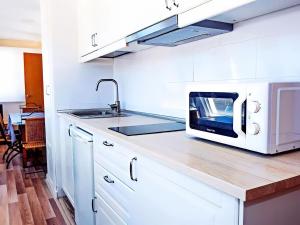 Kuchyňa alebo kuchynka v ubytovaní Apartamento