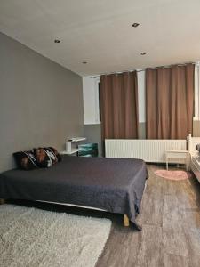 Postel nebo postele na pokoji v ubytování Appartement de caractère