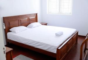 Katil atau katil-katil dalam bilik di Linesa holiday villa