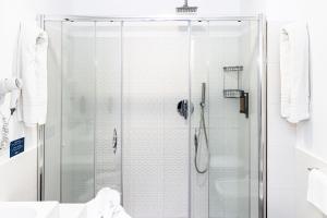 A bathroom at Baia dei Mulini Resort & Spa