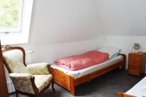 Ein Bett oder Betten in einem Zimmer der Unterkunft Haus Storjohann Dagebüll