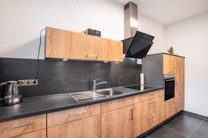 Kuchyň nebo kuchyňský kout v ubytování Ferienwohnung Wilde7