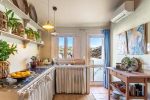 Kuchyňa alebo kuchynka v ubytovaní Ronda Romántica Lofts