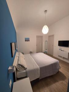 Un televizor și/sau centru de divertisment la Dietro il massimo