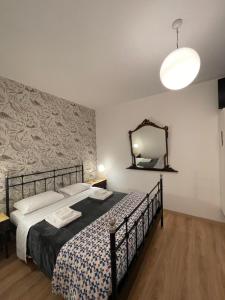 Posteľ alebo postele v izbe v ubytovaní B&B Madam Treviso