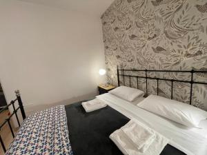 Posteľ alebo postele v izbe v ubytovaní B&B Madam Treviso