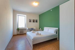 Postel nebo postele na pokoji v ubytování Italianflat - University rooms
