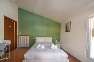 Postel nebo postele na pokoji v ubytování Italianflat - University rooms