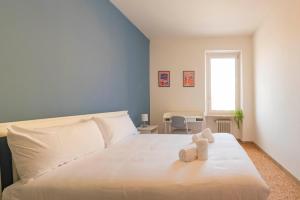Postel nebo postele na pokoji v ubytování Italianflat - University rooms