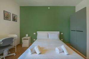Postel nebo postele na pokoji v ubytování Italianflat - University rooms