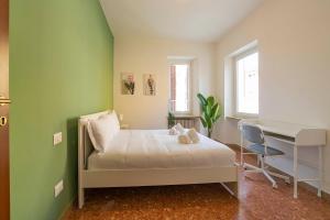 Postel nebo postele na pokoji v ubytování Italianflat - University rooms