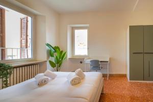 Postel nebo postele na pokoji v ubytování Italianflat - University rooms